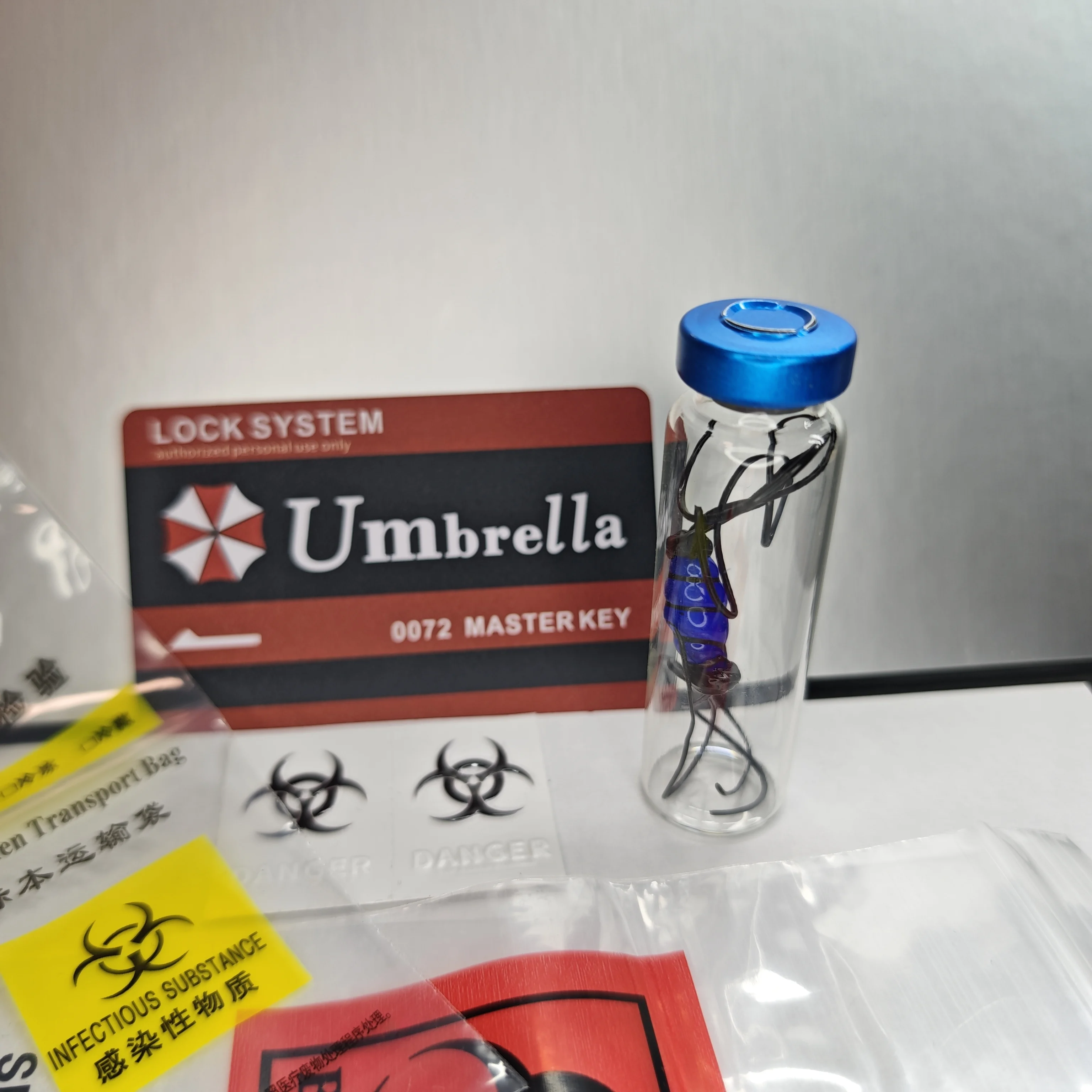 عرض نموذج زجاجة عينة لفيروسات الشر المقيم - هدية قابلة للجمع بشعار شركة المظلة #3