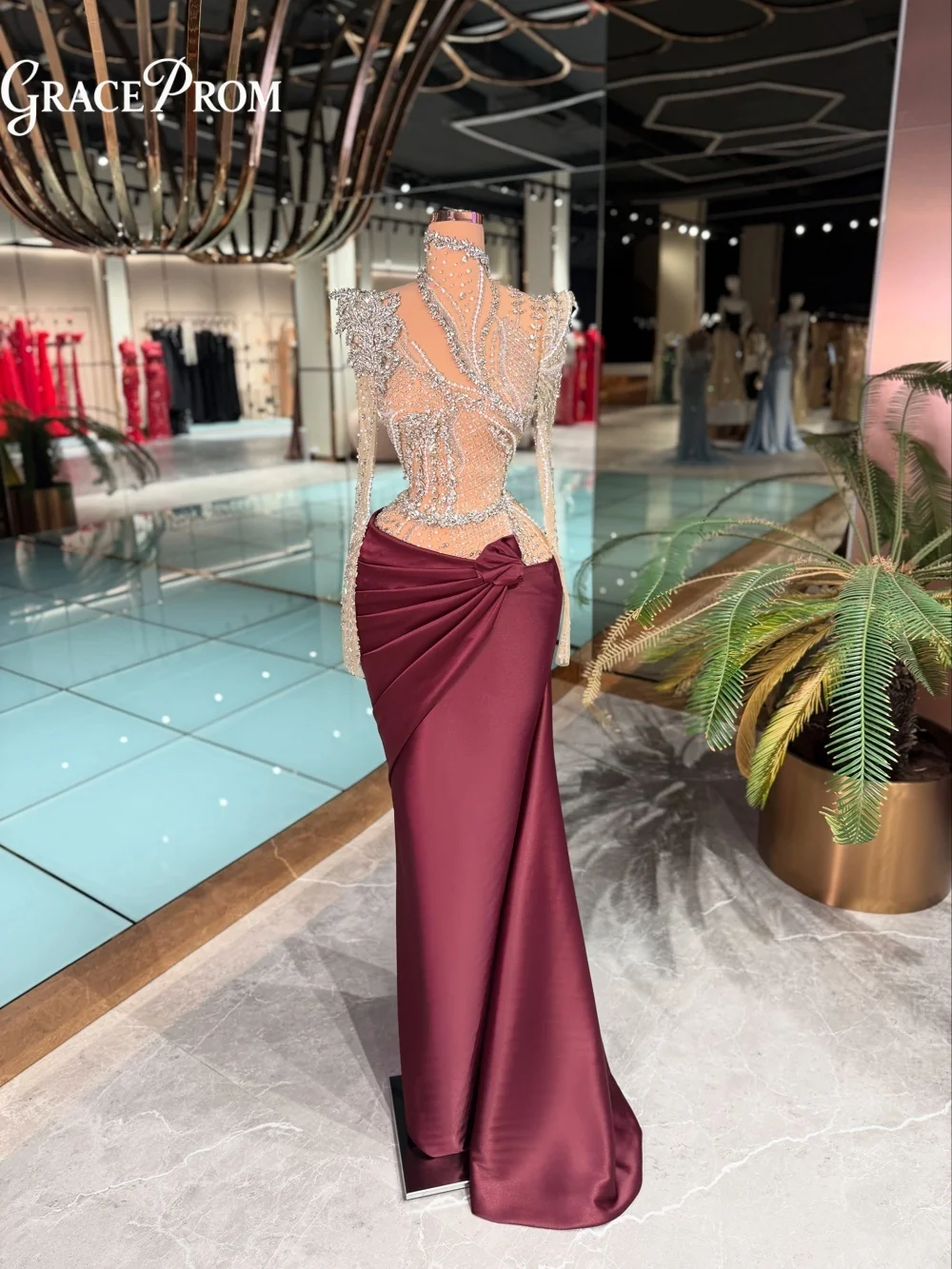 

Stunning Burgundy Satin Evening Gown 2026 Regal Sheer Beaded Crystal Party Dress High Neck For Wedding Guests فساتين سهرة