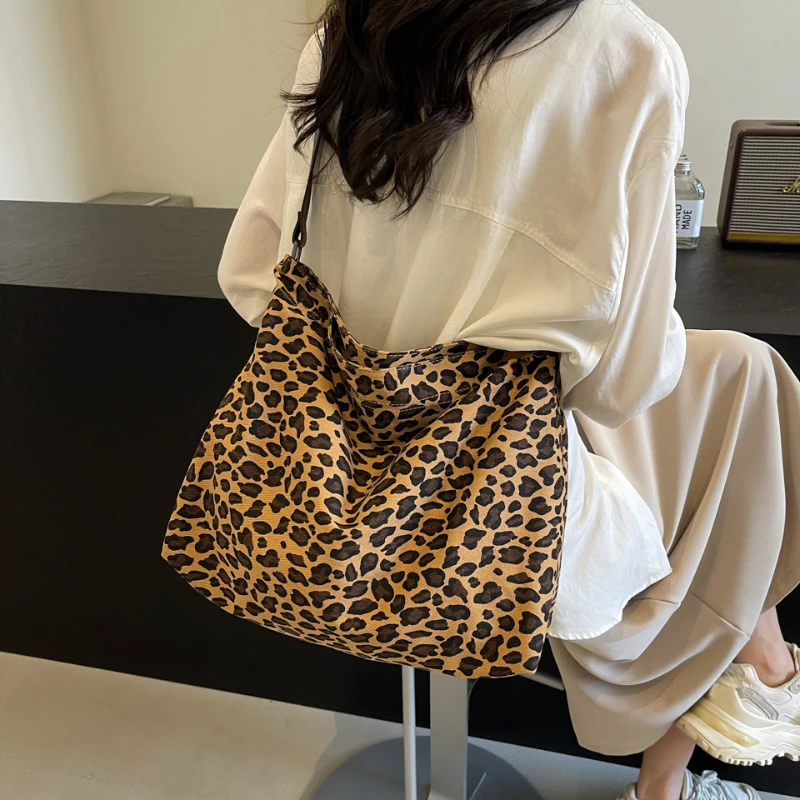 High Quality Explosive Leopard Print Canvas for Women 2024 New High-capacity Crossbody Wide Shoulder Strap Tote Bag for Women