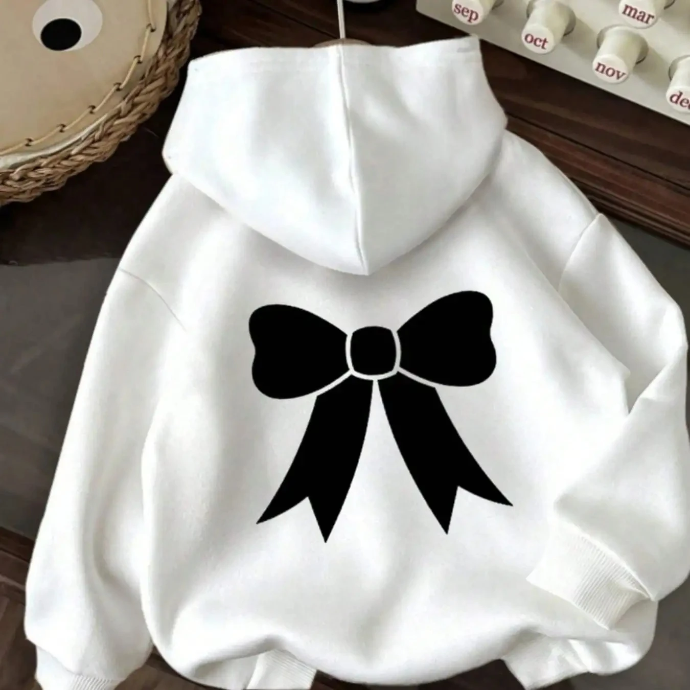 

Solid color simple bow print autumn and winter fashion hooded casual versatile fashion children's hooded sports hoodie
