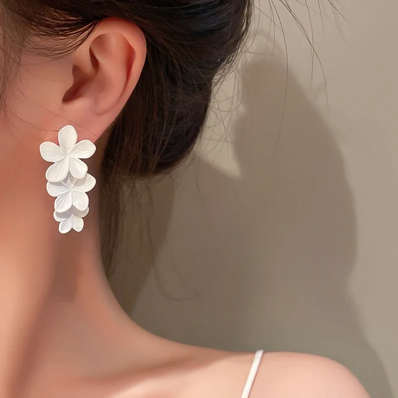 Metal Flower White Painting Women Drop Earrings New Summer Korean Pure White Flower Dangle Earrings Wedding Vacation Jewelry image 4