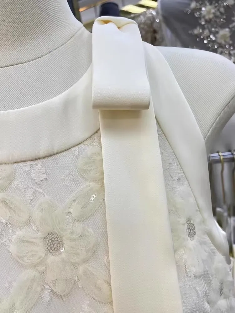 甘い女性フリルスプライシングレース花ノースリーブタンクドレスちょう結びエレガントな夏のパーティーフレンチスタイルの女性 A ラインショートドレス