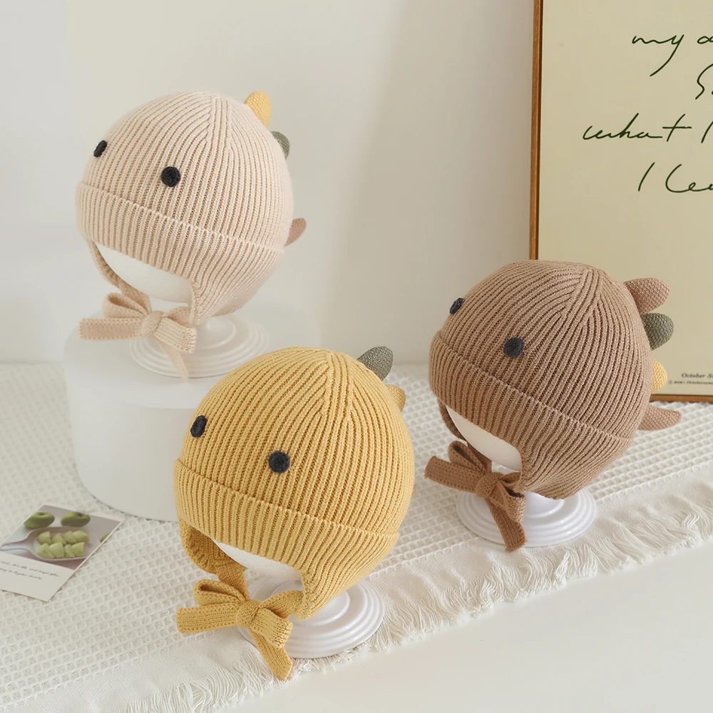 

New Fashion Baby Knitted Cartoon Dinosaur Shaped Hat Outdoor Autumn Winter Warm Hat for Boys and Girls Kids Ear Protection Cap