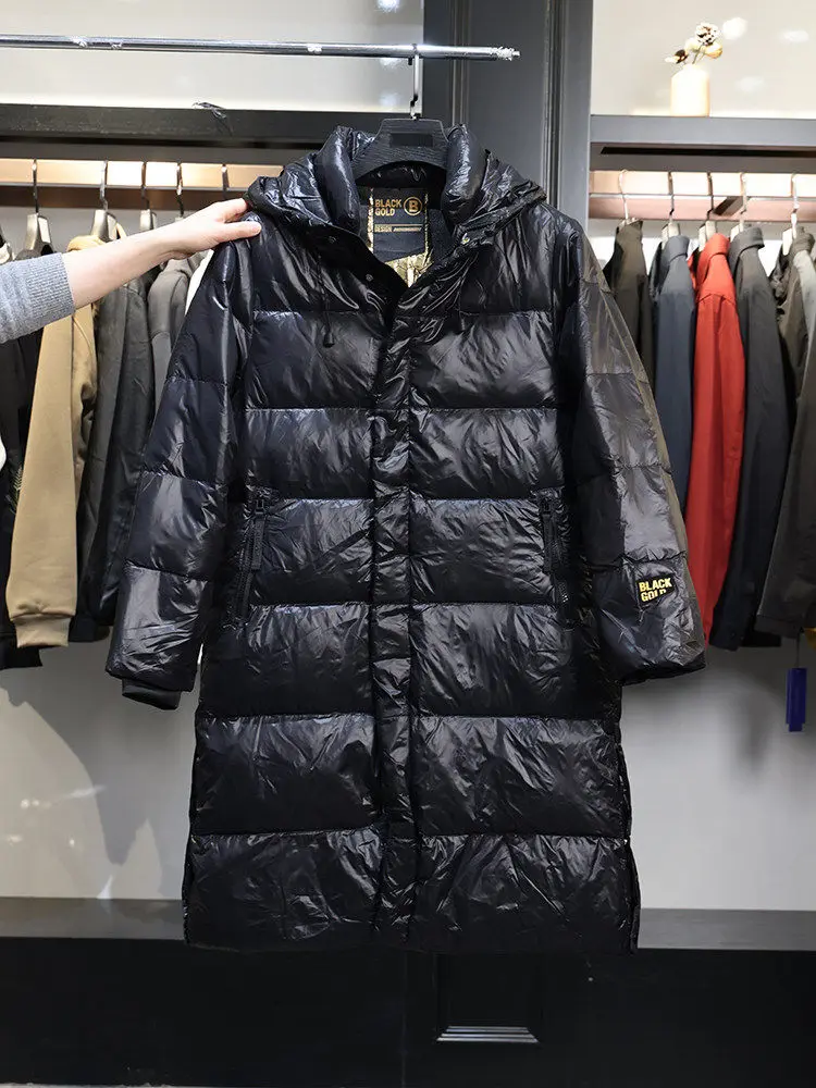 

Douxia 2025 Осенне-зимняя новинка: длинное пальто-пуховик ниже колена, очень теплое, с капюшоном, в современном стиле, из нейлоновой ткани, с наполнителем из пуха...