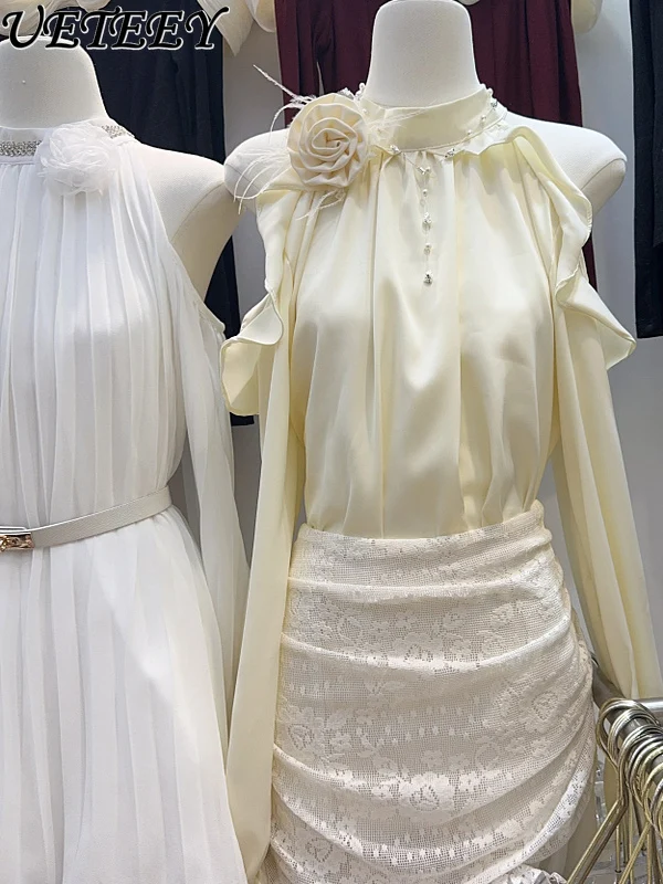 

Нишевая повседневная женская блузка во французском стиле с лямкой на шее, жемчужная лоскутная рубашка с рюшами и подолом, новый летний однотонный универсальный топ