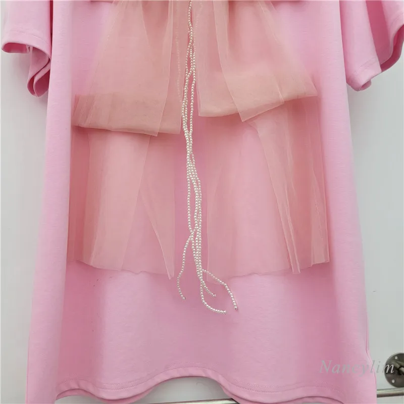 โบว์ตาข่ายSplicingเสื้อยืดแขนสั้นผู้หญิง 2025 ฤดูร้อนใหม่เกาหลีรุ่นหลวมยาวขนาดใหญ่Tshirt