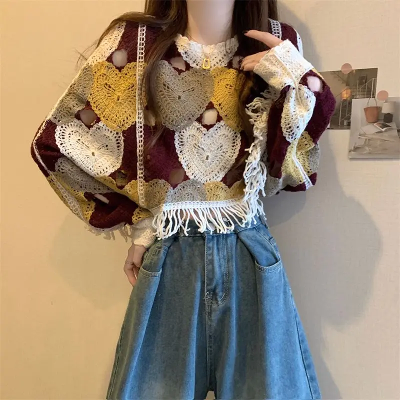 Koreaanse stijl ontwerp gebreide trui dames vroege herfst 2024 nieuwe gehaakte holle kwast losse en dunne top met lange mouwen
