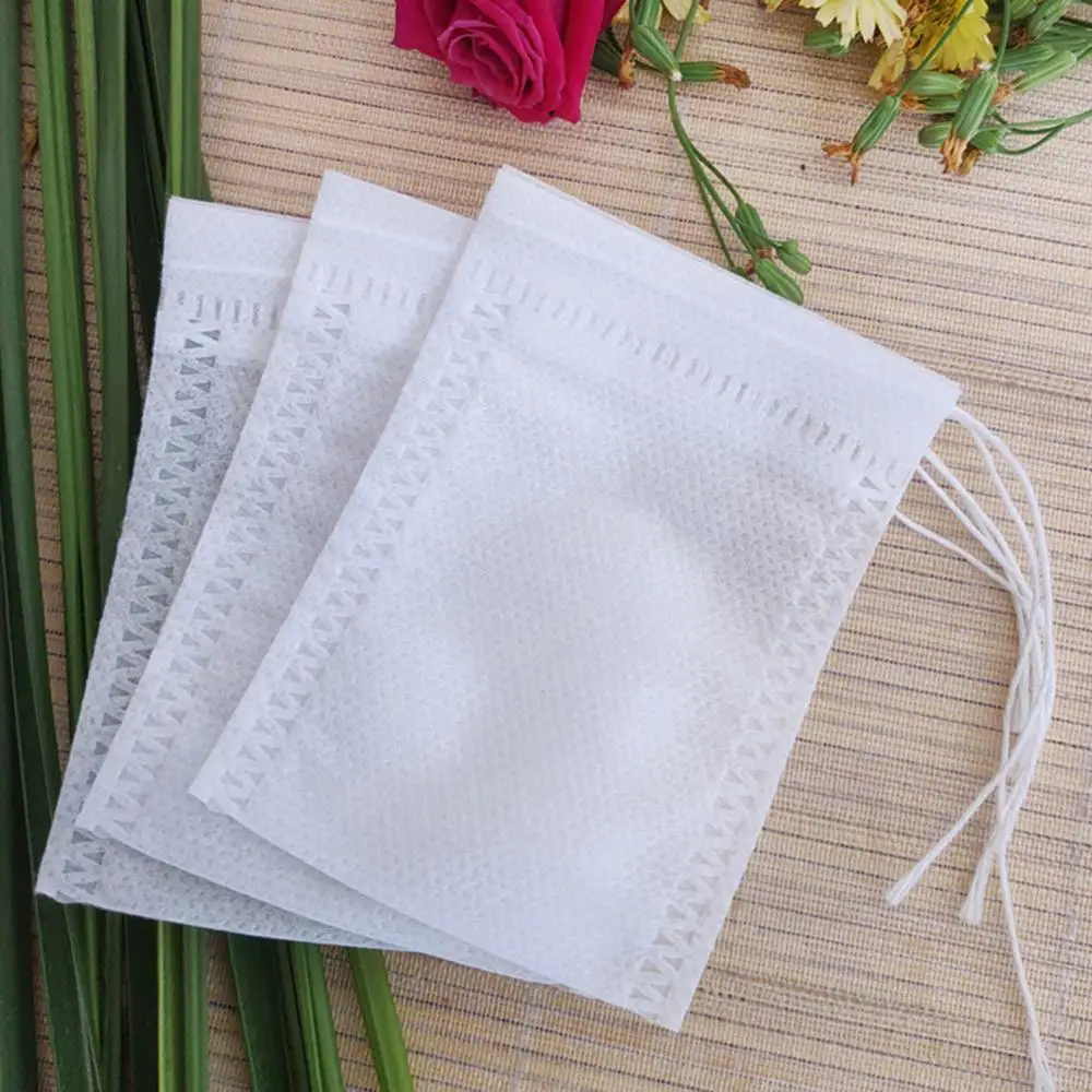 100Pcs Non-woven Fabric Tea Bags Tea Filter Bags Kitchen Disposable Drawstring Non-Woven Fabric Tea Herb Filter BagTea Strainer