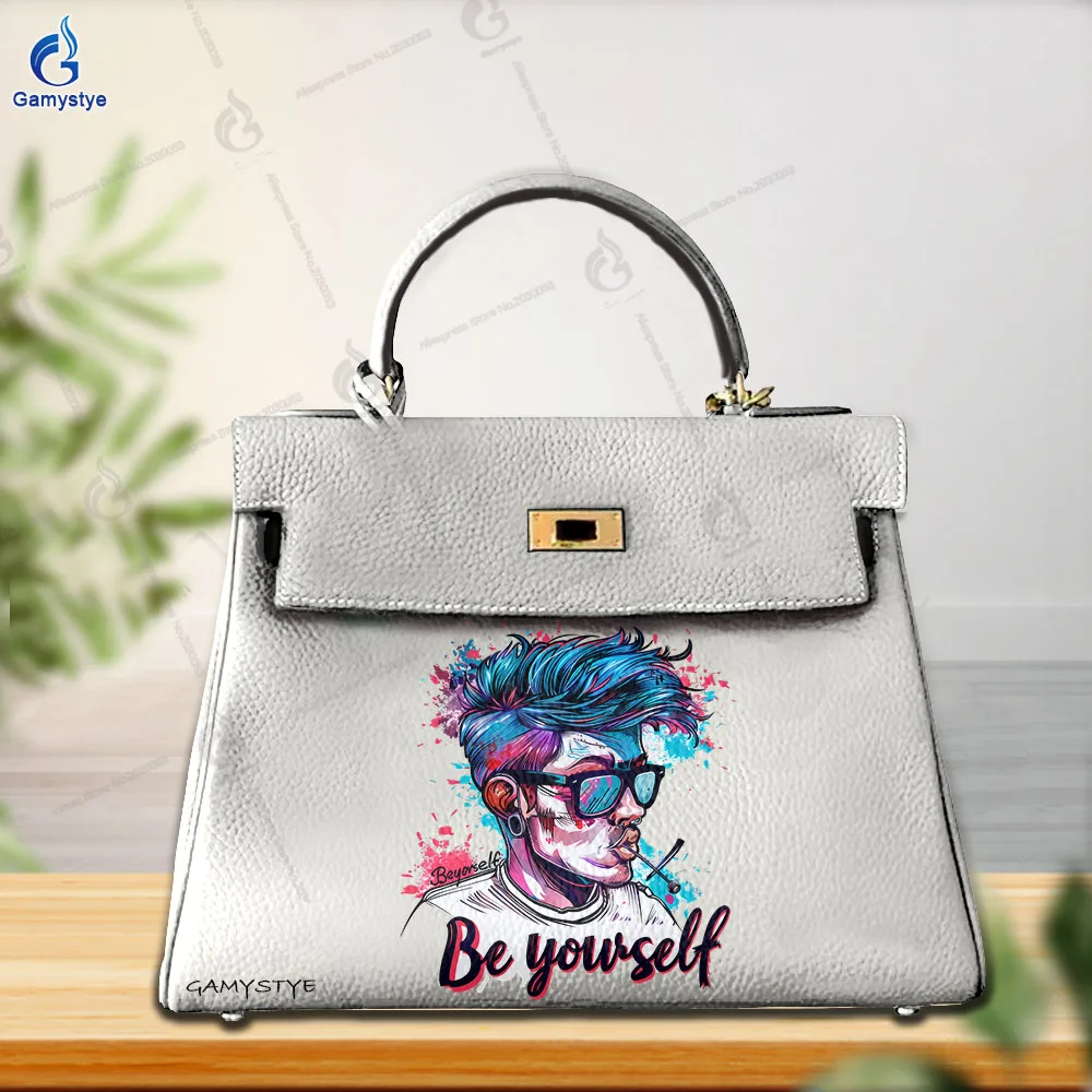 فن طباعة تخصيص حقائب اليد الكرتون مجردة شخصية الصورة الرمزية طباعة عالية الجودة جلد طبيعي حقائب النساء حقائب بيد الصليب