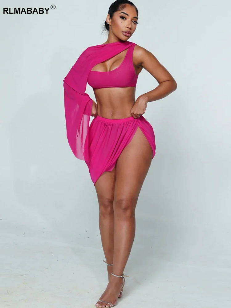 

RLMABABY Sexy Sheer Mesh Mini Skirts 2 Piece Set Women One Shoulder Sleeve Crop Top And Low Waist High Split Skirts Matching Set