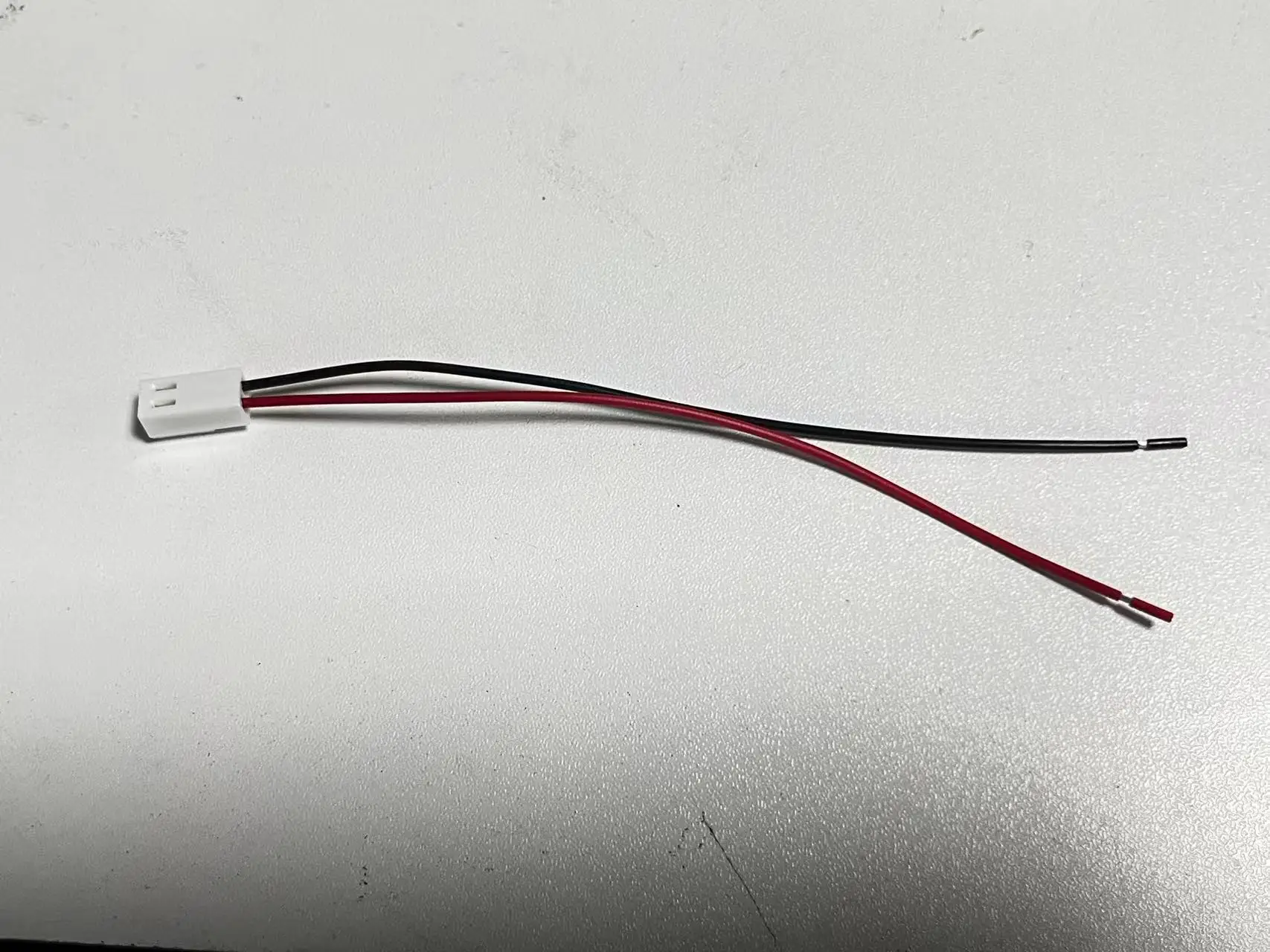 

2.54mm Pitch 2P Cable, HXH 2510-2Y with pigtail, L=120mm, 2 Color Wires, 100pcs per Bag, Customization Cable