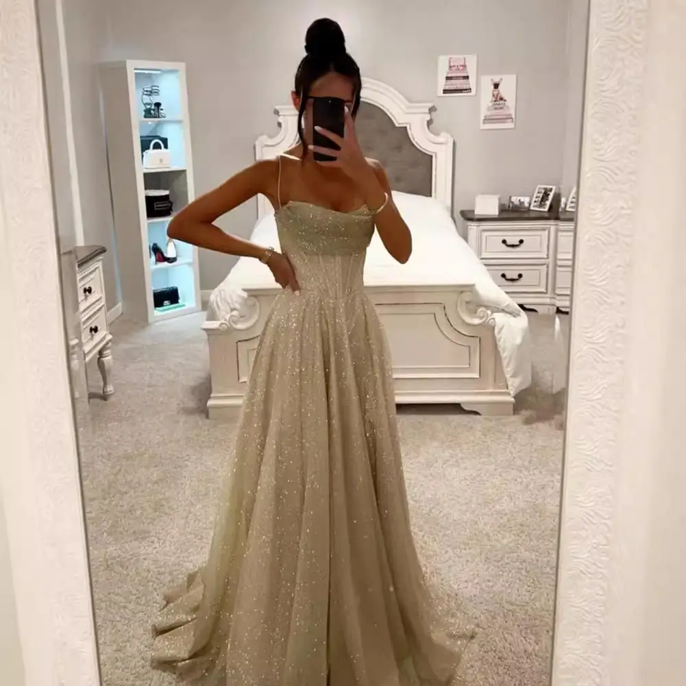 فستان الحفلات المسائية بدون ظهر بحزام سباغيتي ترتر بدون أكمام على شكل حرف a بطول الأرض فستان كوكتيل بطيات منخفضة القطع