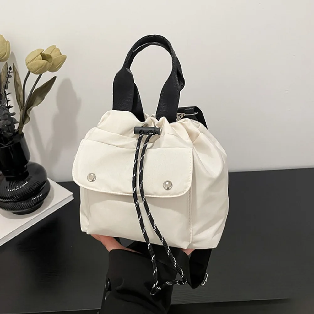 

Милая сумка-ведро в корейском стиле на шнурке, нейлоновая сумка через плечо, сумка для телефона, однотонная маленькая сумка-кроссбоди для путешествий