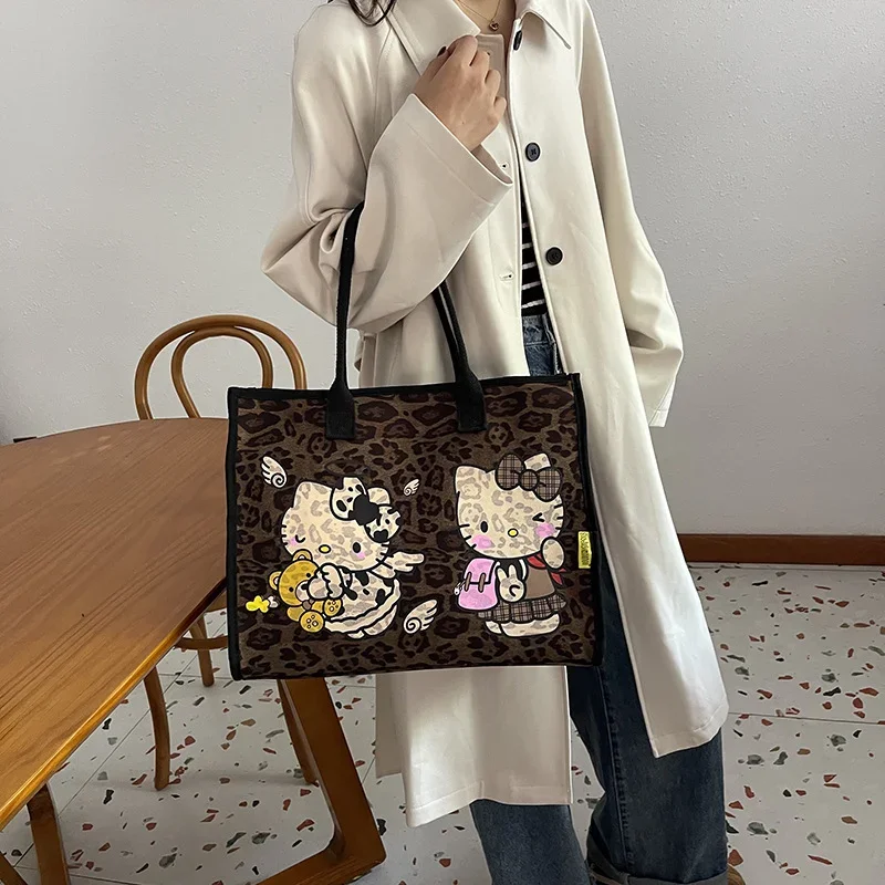 Sanrio Hello Kitty tas kanvas wanita, kapasitas besar Vintage pola macan tutul tas belanja lucu kartun tas Tote tas tangan bahu