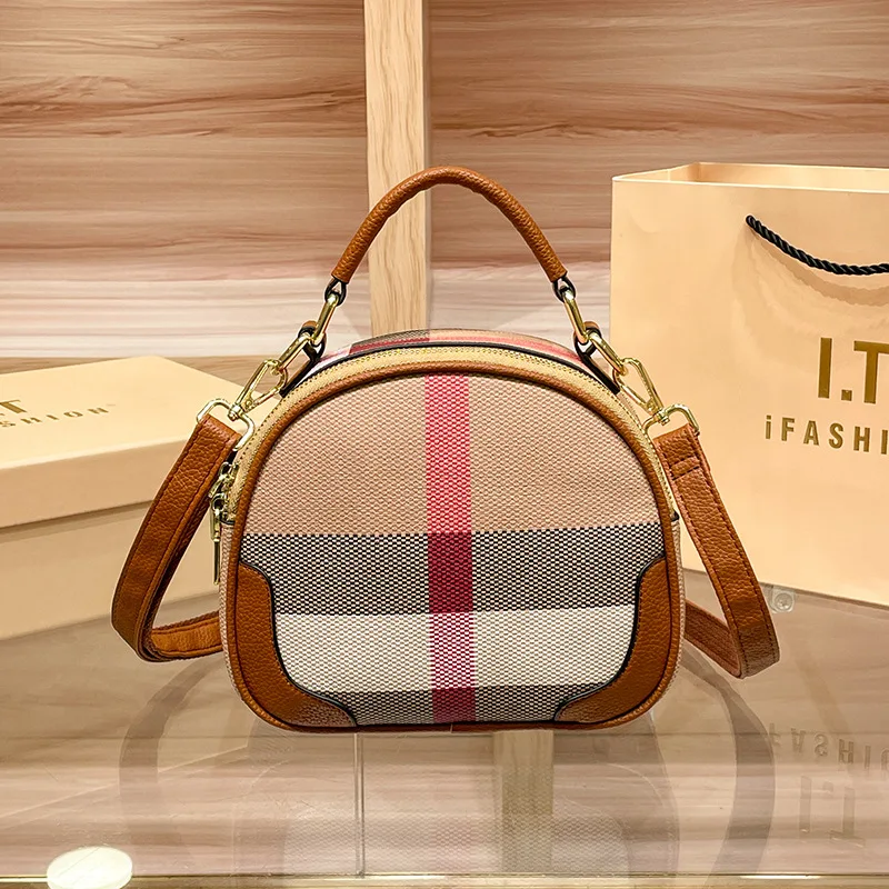 

Light luxury high-end plaid printed hand-held small round bag, new retro printed shoulder bag, apple bag