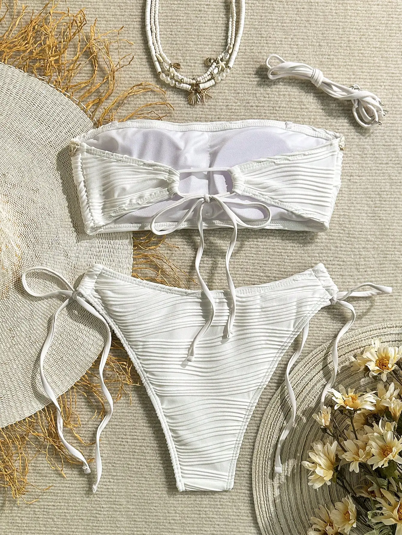 

White Textured Solid Color Shell Trim Halter Tie Bikini Set