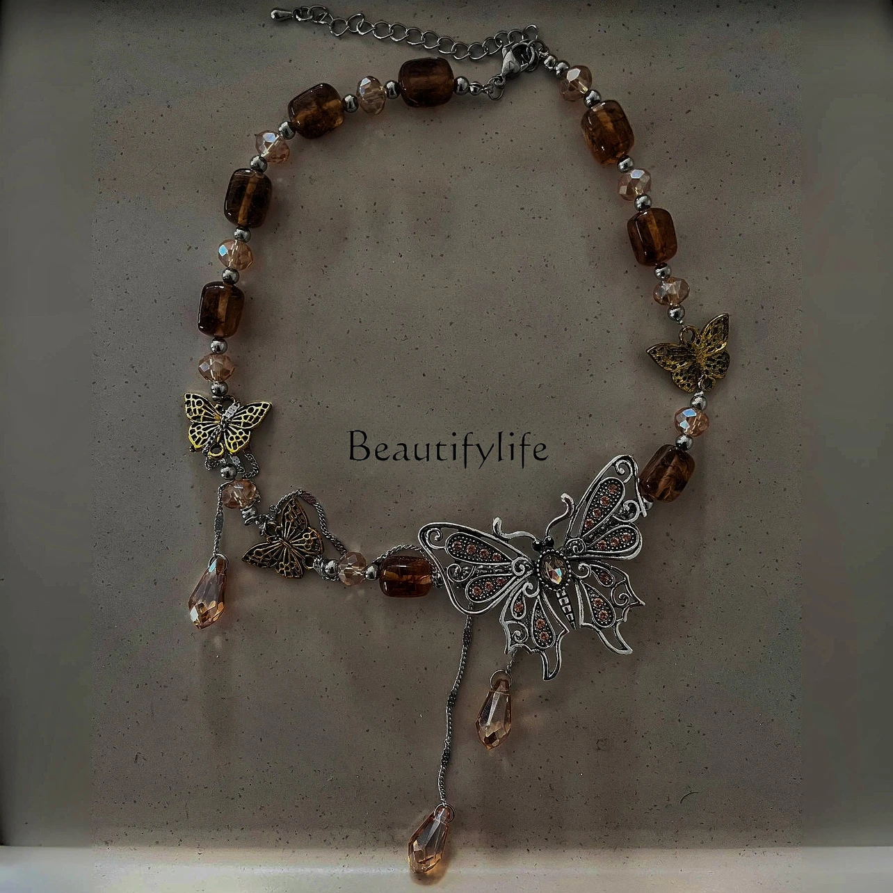 

Amber Vintage Butterfly Distressed Metal