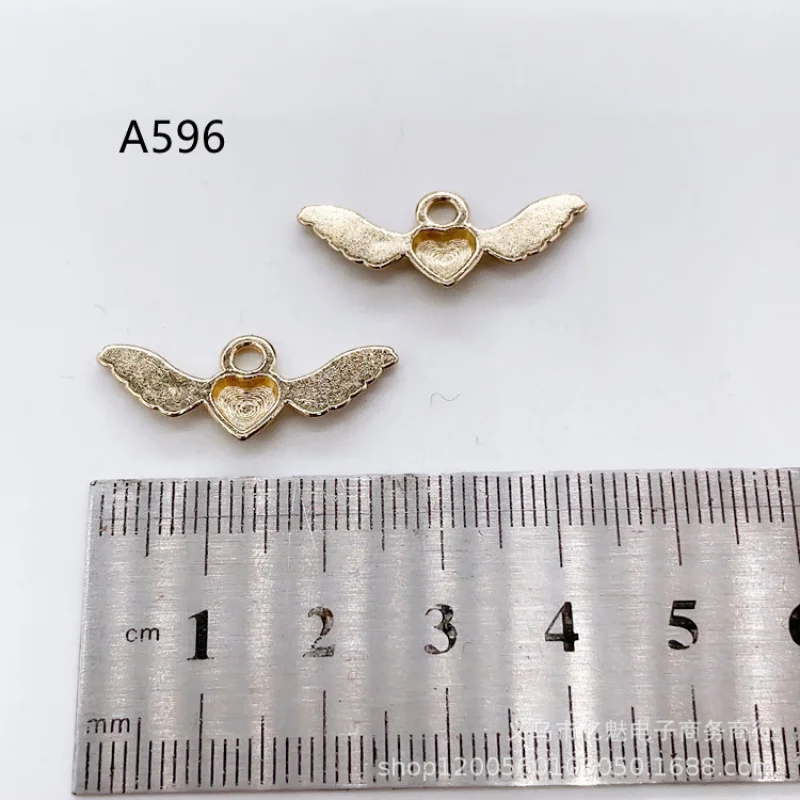 Factory Direct Sales 100Pieces DIY Ornament Zinc KCColor Peach Heart Wings Pendant Necklace Clothing Widget