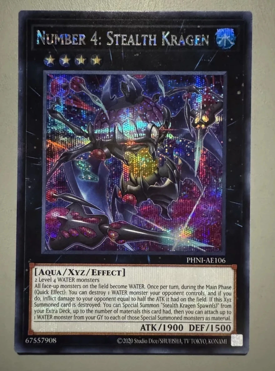 

Yugioh KONAMI Duel Monsters PHNI-AE106 Number 4: Stealth Kragen Secret Rare Asian English Collection Mint Card