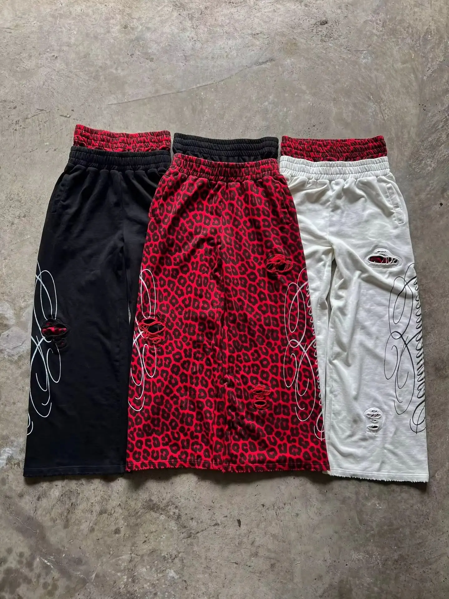Pantalones deportivos casuales con doble cintura, estampado de leopardo, rotos, de alta gama, funcionales, tácticos, con cordón ajustable, para hombre y mujer.