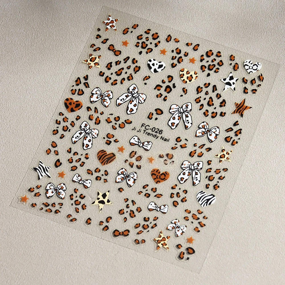 3D ヒョウ弓ハートネイルステッカーかわいいヒョウ柄リボンスターネイルアートデカール秋冬 8*10 センチメートルマニキュア装飾