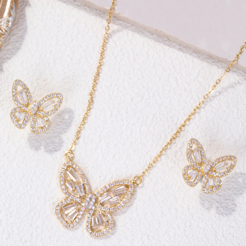 

A set of high-quality butterfly-shaped decorative earrings and necklace made of copper and set with zirconia stones