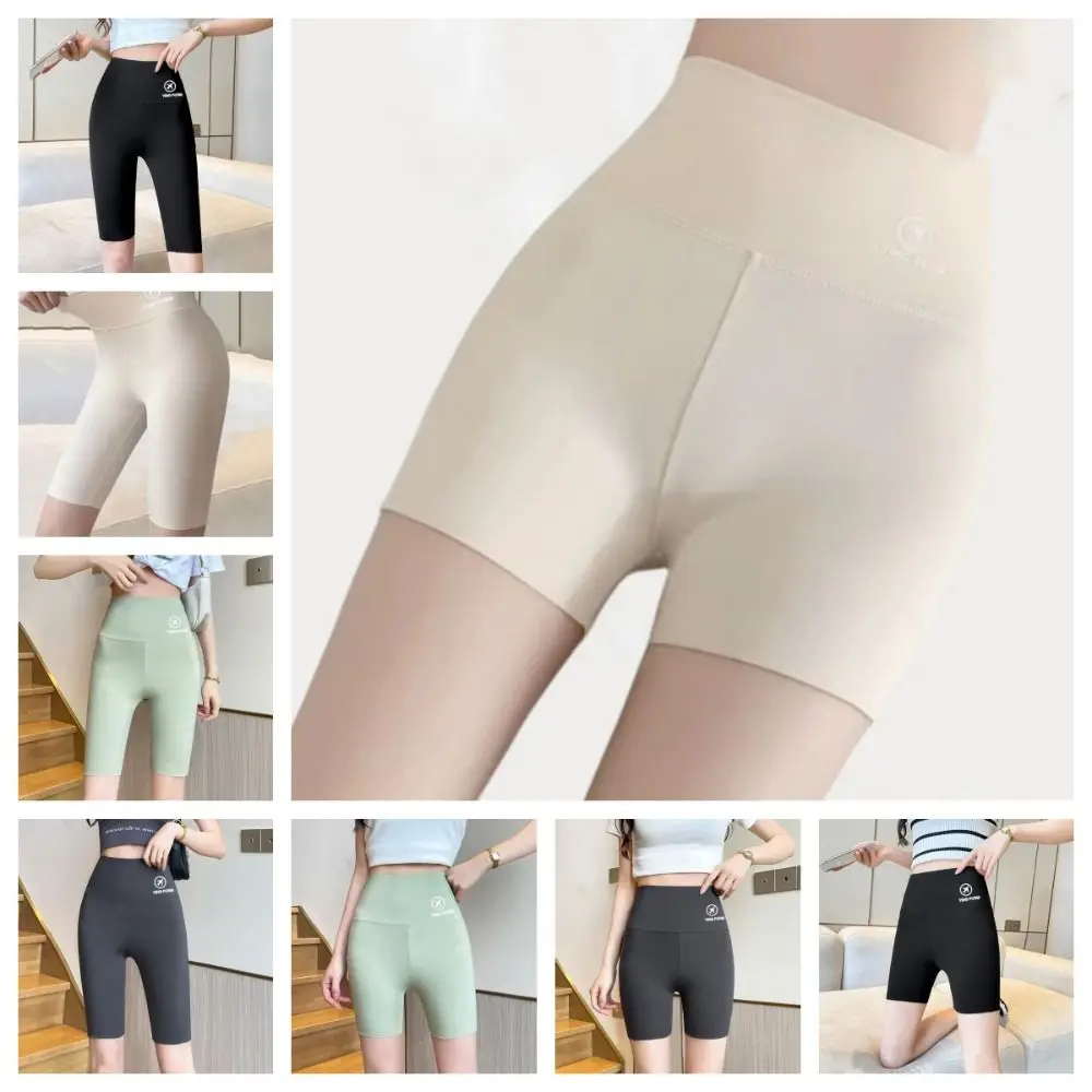 Pantaloncini da yoga attillati per il sollevamento dell'anca Pantaloncini da motociclista elastici per il controllo della pancia dei glutei traspiranti per il controllo della pancia dei glutei da donna