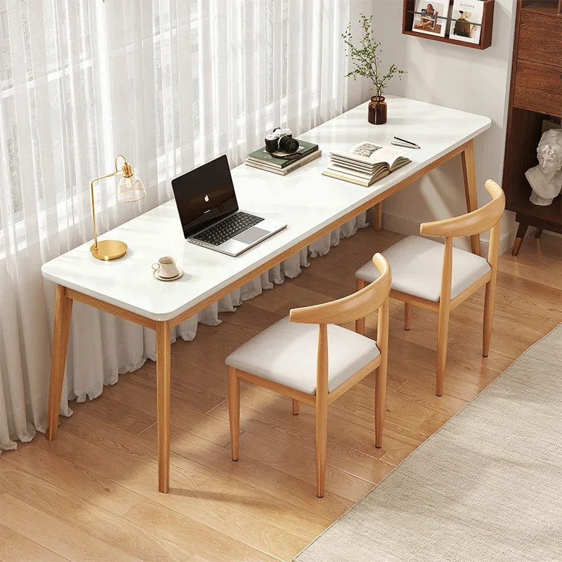 

A narrow rectangular office with two solid wood legs, a long strip against the wall, and a computer desk