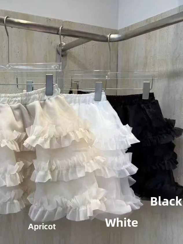 ربيع 2025 المرأة مرونة الخصر رقيق f تنورة كعكة ort تنورة السراويل أجراس خشبية عالية الخصر الحلو Sle ort طول