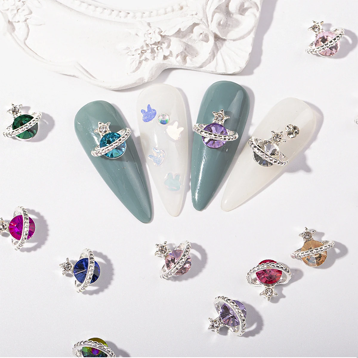 

60pcs / 1 box 12 palace alloy color planetary nail diamond decoration cosmic elements Saturn, planetary nail metal decoration