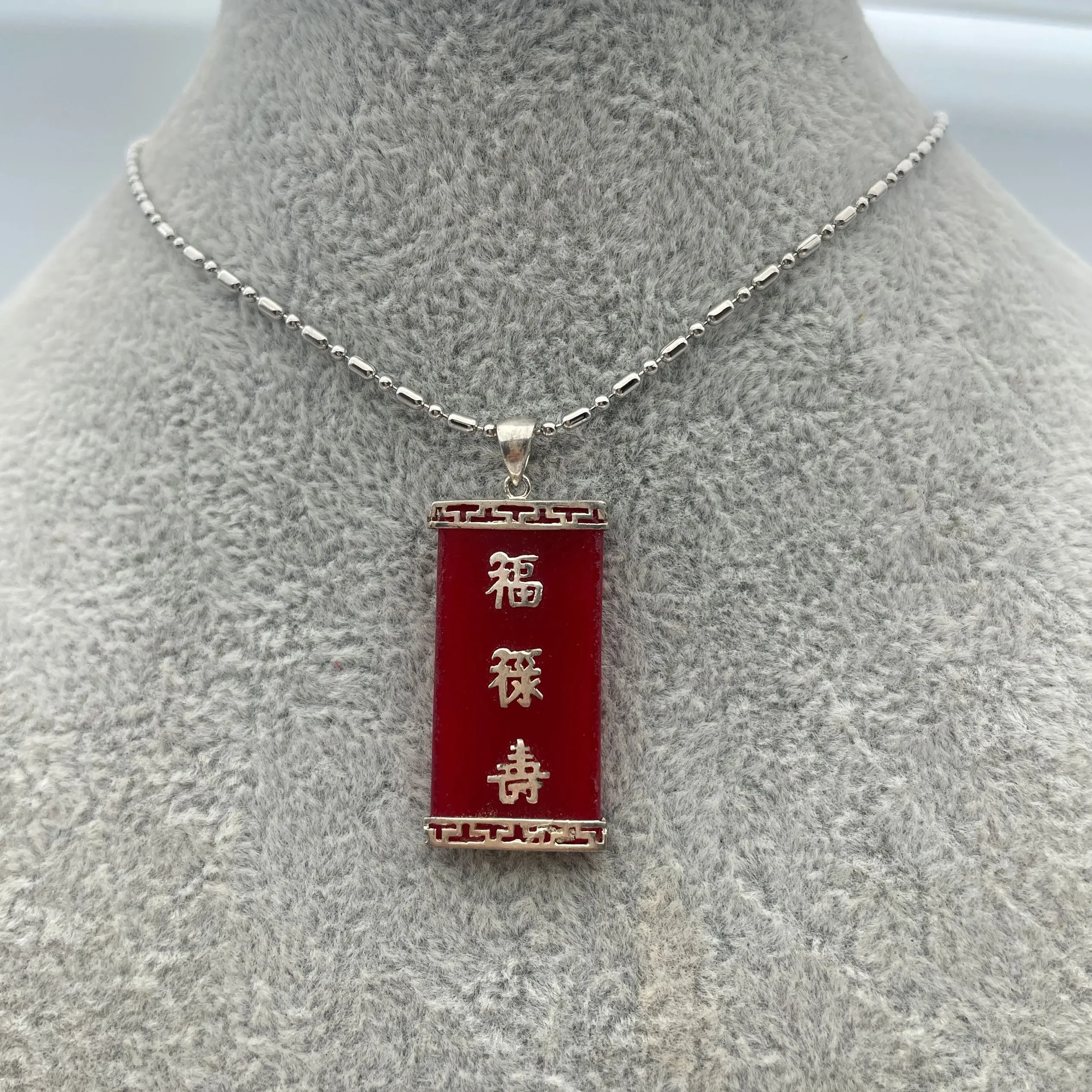 

Women's classic fashion long Fu character light RED jade pendant necklace