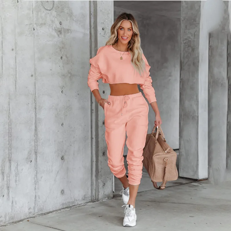 Autunno nuova felpa con cappuccio ultra corta casual pantaloni lunghi da donna set da 2 pezzi moda elastico in vita con lacci tasca pantaloni lunghi set di abbigliamento sportivo