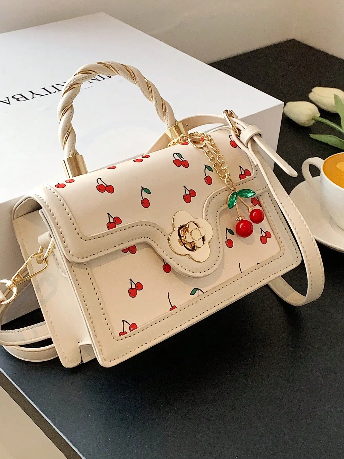 

Cream Cherry-Printed Square Flap Handbag with Twisted Handle and Chain Strap