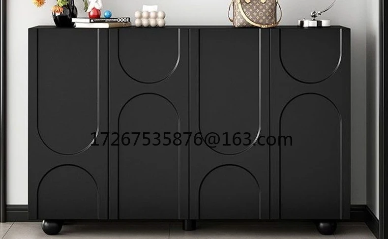 

Modern simple shoe cabinet entrance integrated against the wall black storage locker