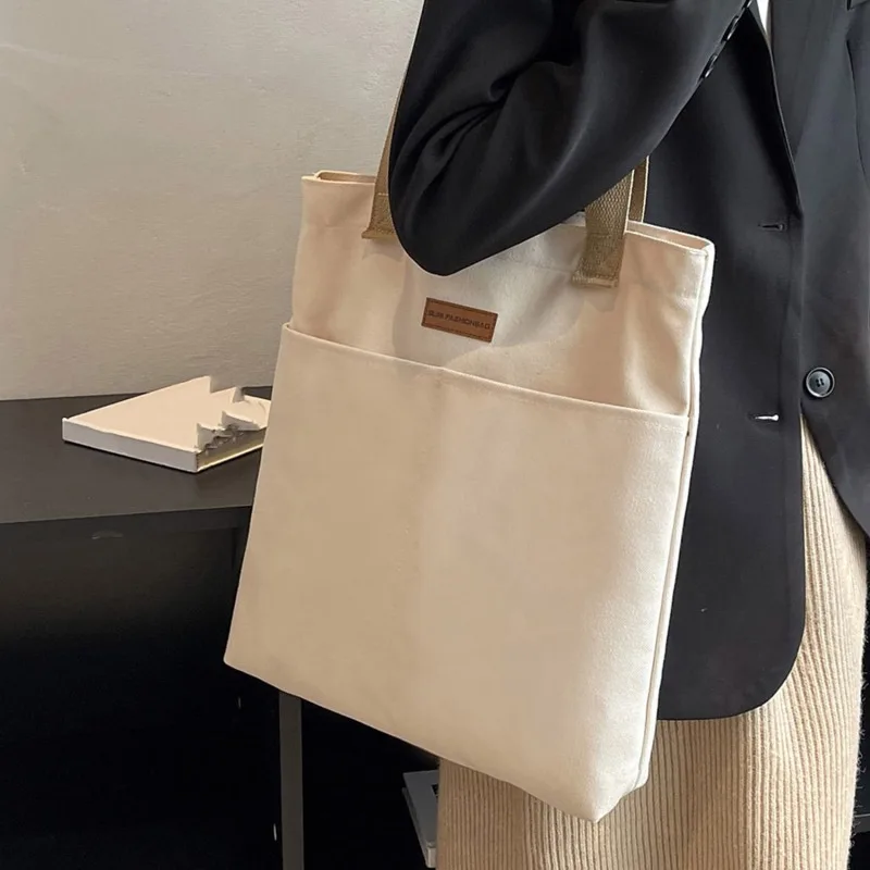 Borsa tote da donna in tela con filo da cucito, borsa a senso avanzato di grande capacità, comoda e pratica borsa da pendolare da donna