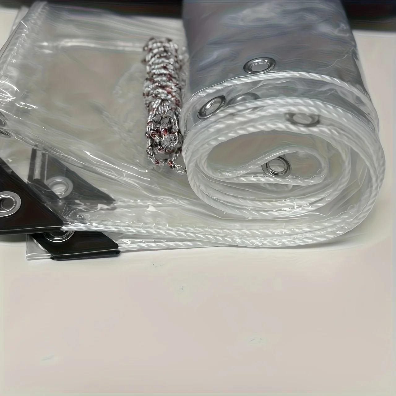 

Durable Waterproof Tarpaulin! Made of Transparent and Thickened Pvc Material, It Is Anti-Aging, with Metal Eyelets and Sealing R [Likely Incomplete, Needs Context for Full Translation].