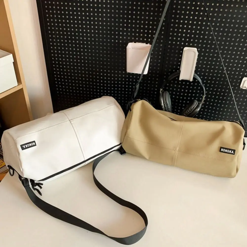 

Causal Sports Shoulder Bag Solid Color Large Capacity Nylon Cloth Shoulder Bag Leisure Lightweight Cylinder Messenger Bag Travel