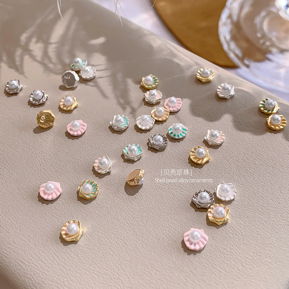 Exquisito y bonito corona de perlas de concha, estrella de mar, diamantes de imitación de Metal, joyería de aleación para playa y mar, accesorios para decoración de uñas