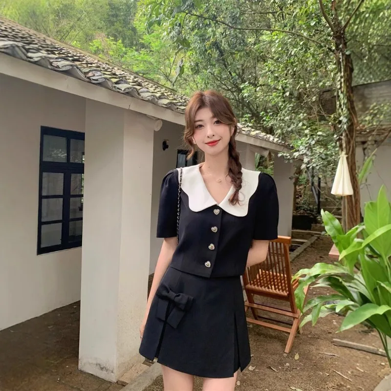 

Двухсекционный наряд на соленую тематику с черной кукольным вырезом, короткими рукавами, облегающей бедра короткой юбкой, яркий милый женский летний стиль