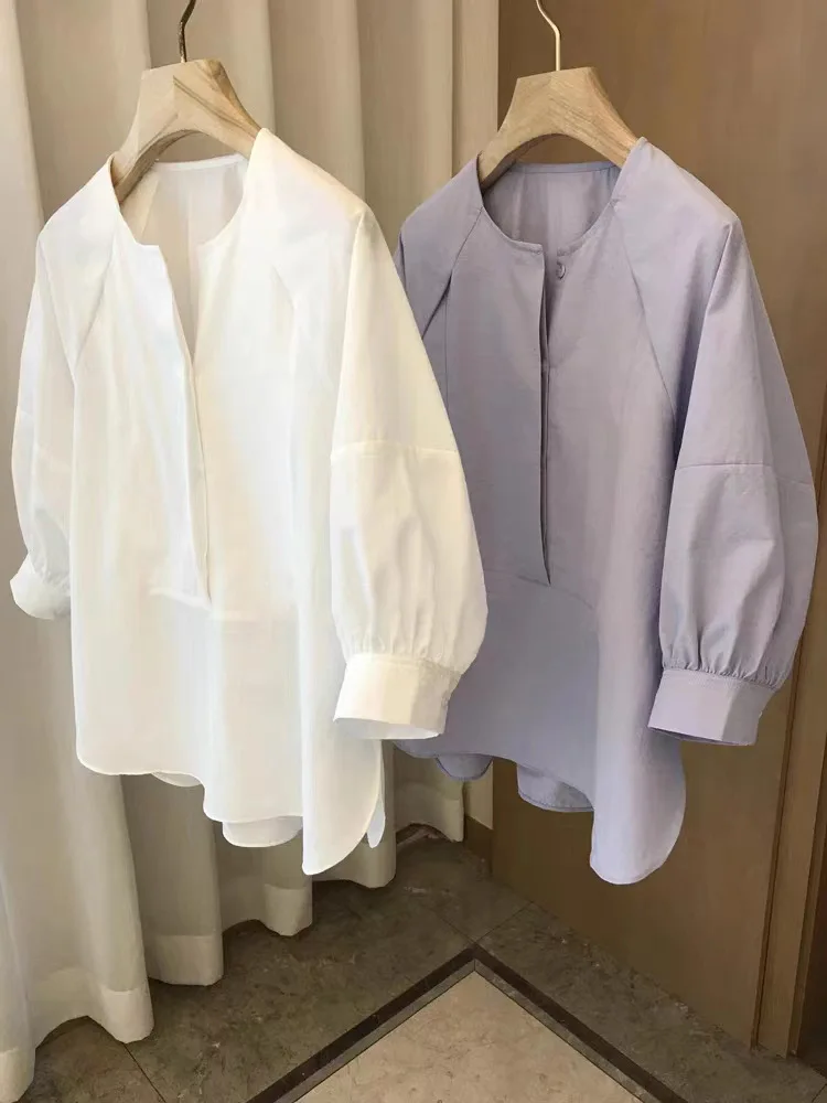 

Spring and summer women's casual solid color round neck long sleeved loose shirt