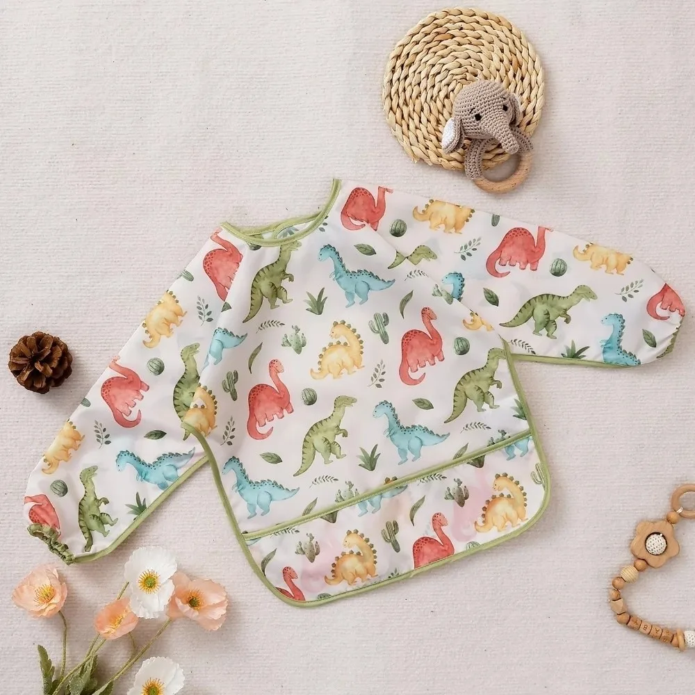 

Washable Waterproof Baby Bibs Colorful Cartoon Printing Pocket Design Feeding Apron Long Sleeve Water Dirt Proof