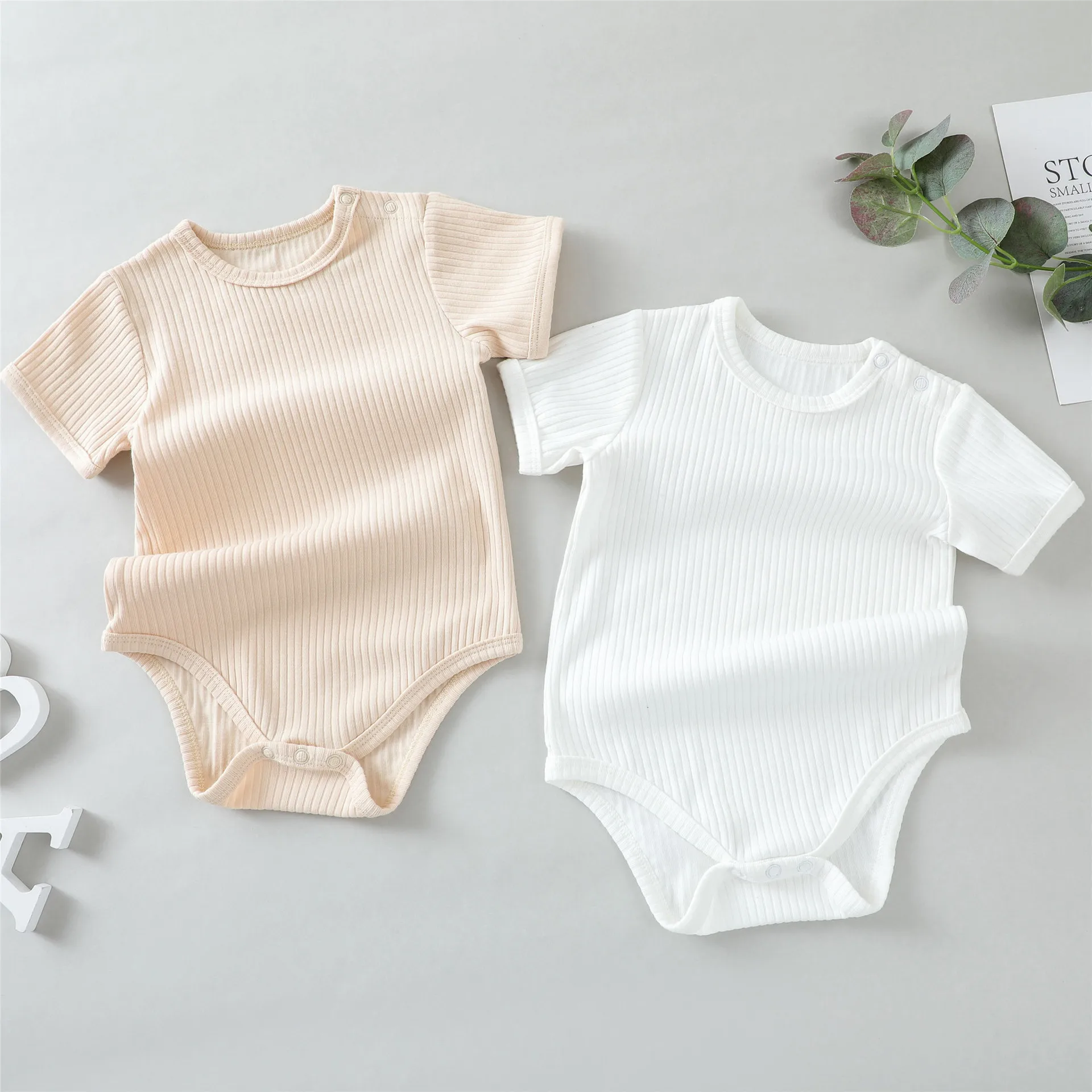 

2022 Summer Baby Rompers White Color Baby Jumpsuits Short Sleeve Infant Bodysuits Ribbed Fabric Newborn Baby Clothing