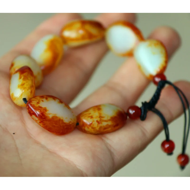 

Hetian White Red Infusion Leather Jade Pebble Rough Stone Bracelet Men And Women