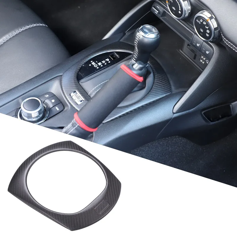 

Real Carbon Fiber for 2016-2026+ Mazda MX-5/Fiat 124/Abarth 124 Center console gearshift outer frame Sticker Car Accessories