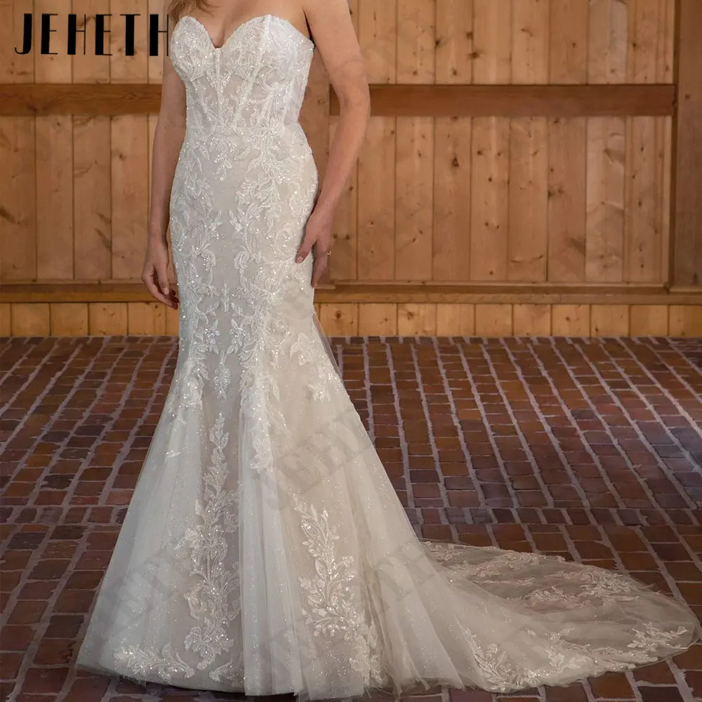 JEHETH Zeemeermin Appliques Tulle Bruidsjurken 2024 Sexy Mouwloze Trouwjurken Lace Op maat gemaakte vestidos para mujerJEHETH Zeemeermin Appliques Tulle Bruidsjurken 2024 Sexy Mouwloze Trouwjurken Lace Op maat gemaakte