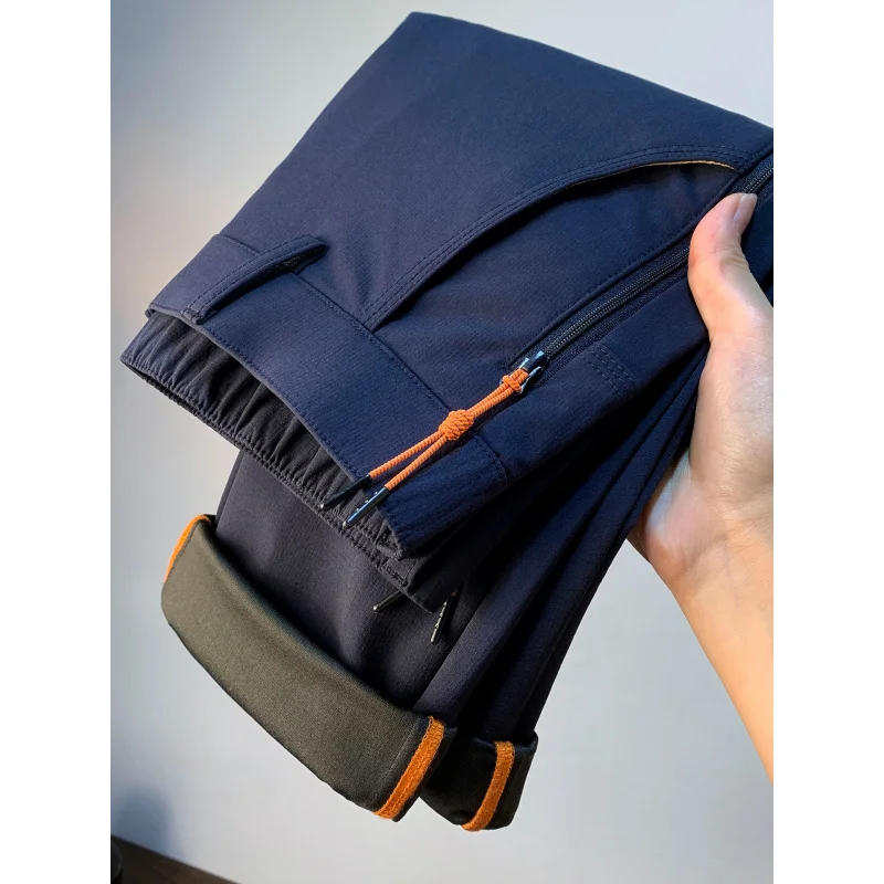 Pantaloni casual da uomo larghi a tubo dritto per la primavera e l'autunno 2025, pantaloni da pendolarismo alla moda da uomo elastici con tasca con cerniera di tendenza