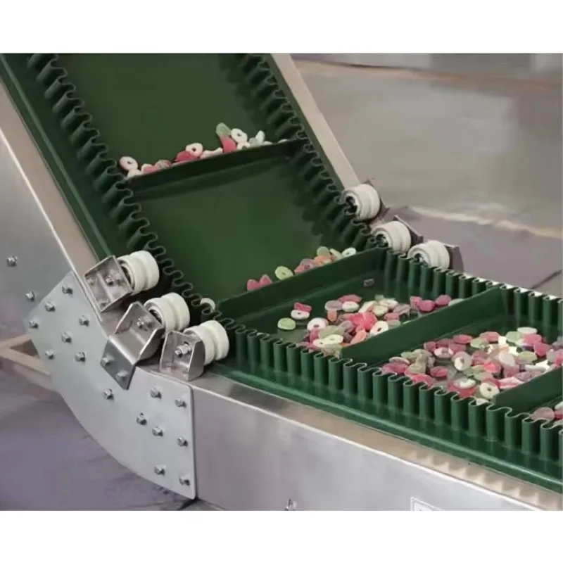 Elevator With Hopper To Move From Mixer To Feeder Conveyor