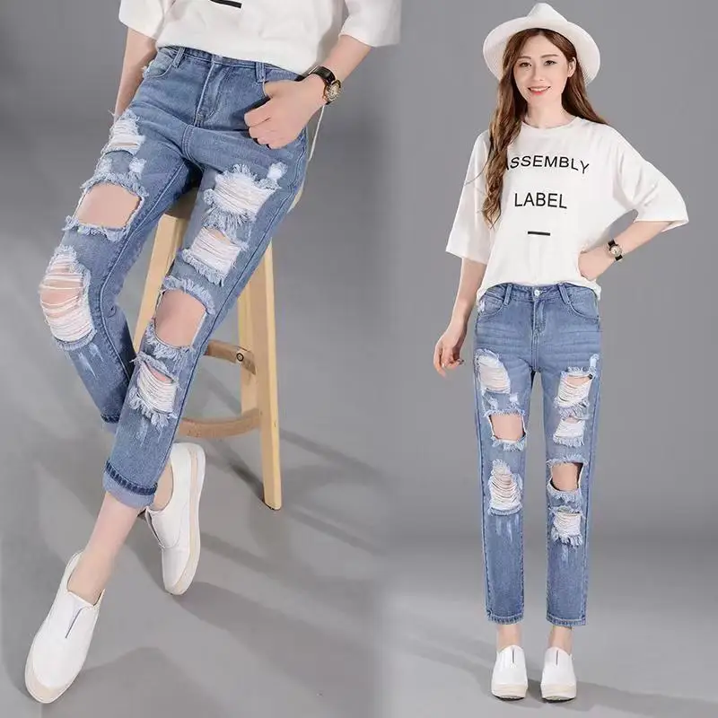Spring and Summer New Harun ripped jeans women fashionable BF style high waist slimming street nine cropped carrot pants