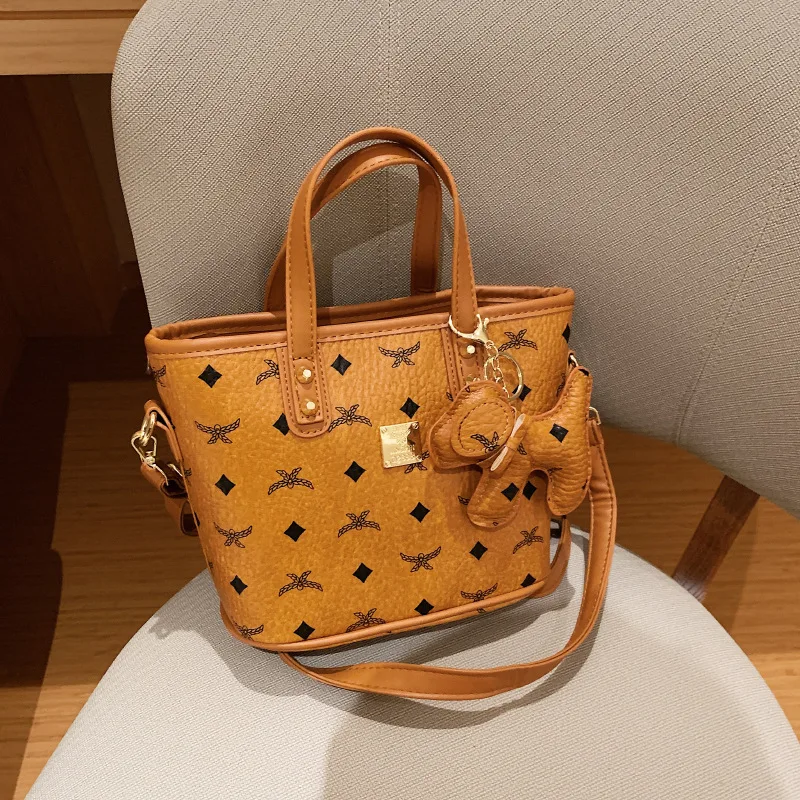 

Текстурированная сумка-тоут на рынке 2025 года, женская роскошная студенческая сумка через плечо, через плечо «день-ночь», повседневная пригородная сумка, кожаная сумка