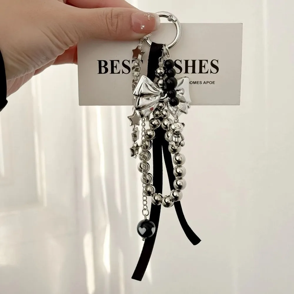 Eleganter, zarter, perlenbesetzter Schlüsselanhänger mit Schleife und Stern, Y2K, handgefertigter Taschenanhänger, Metall-Schlüsselanhänger mit Schleife, Anhänger für Damen